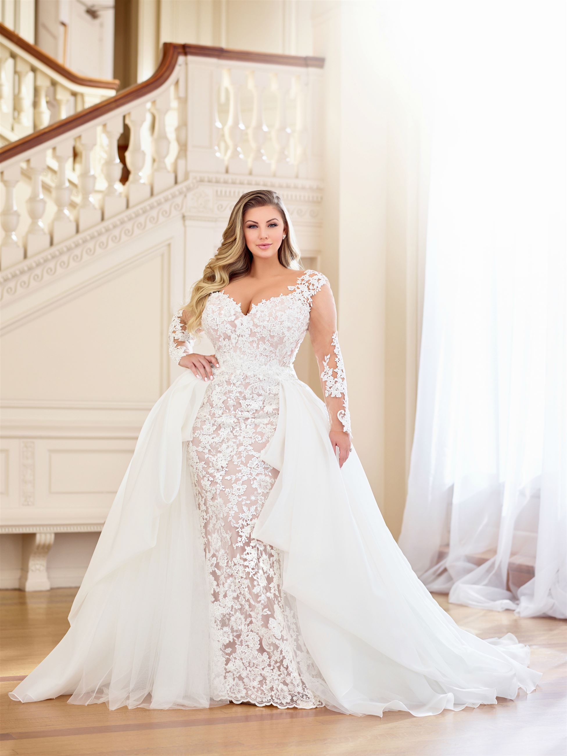 Plus size fit and flare wedding dress with detachable train