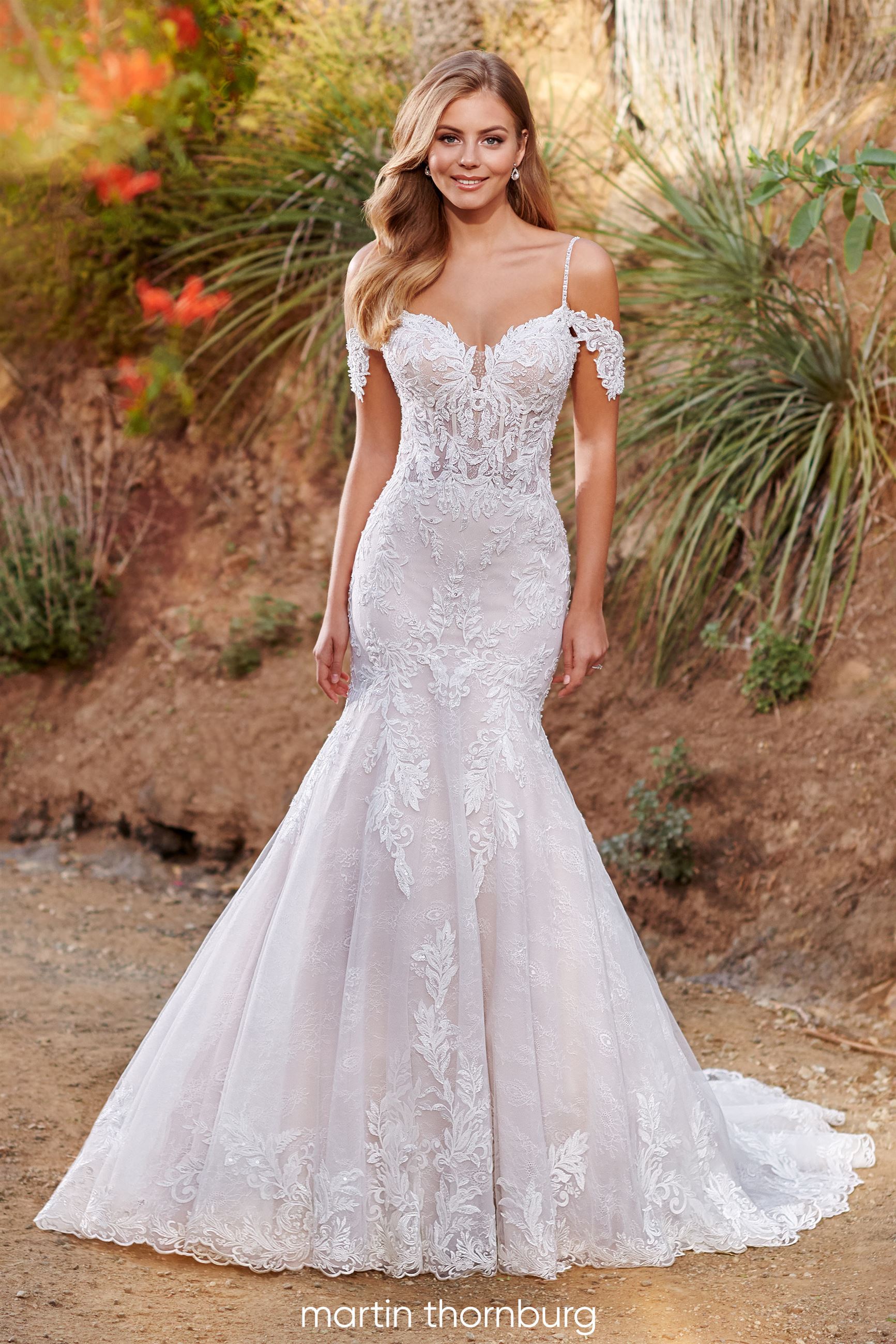 Bride wearing mermaid wedding dress with lace fabric