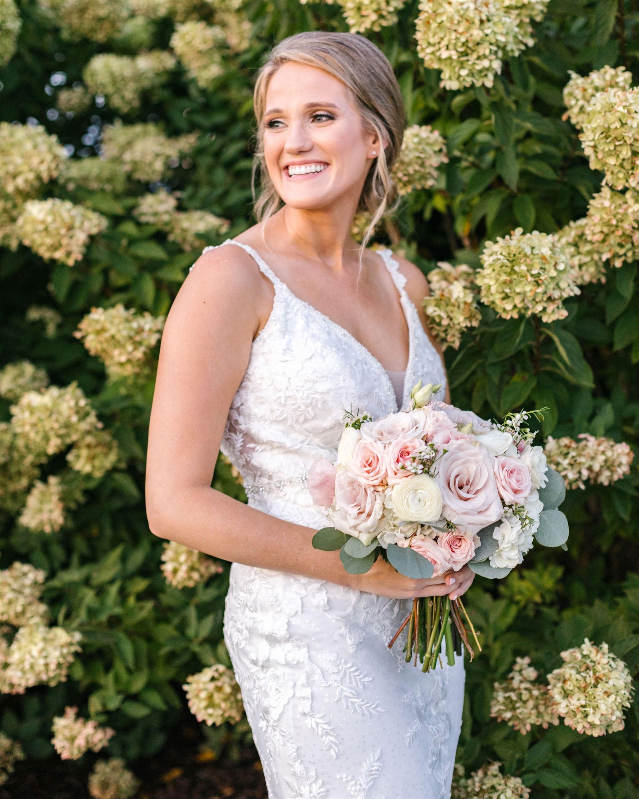 Bride wearing Martin Thornburg wedding dress