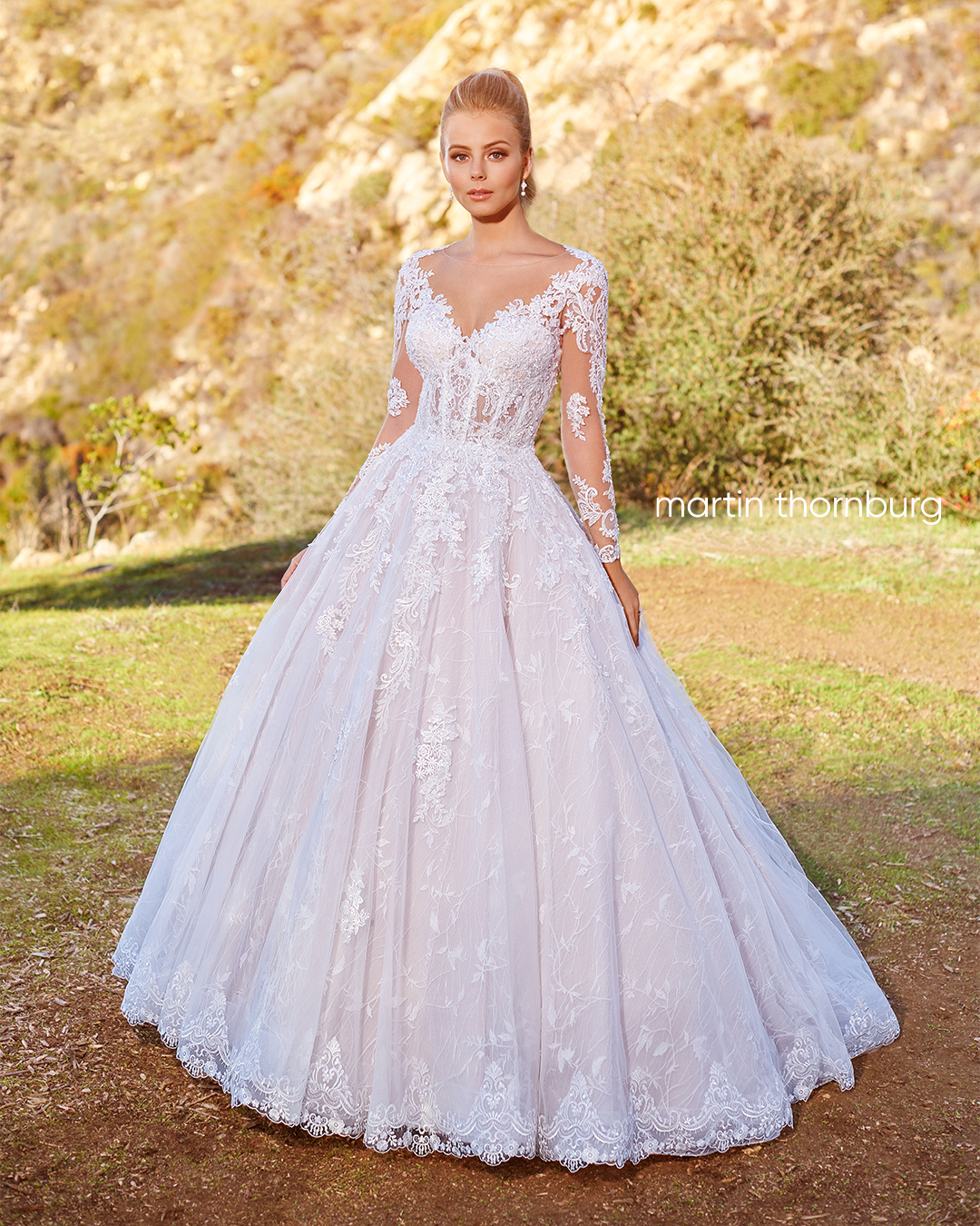 Bride wearing long sleeve lace wedding dress