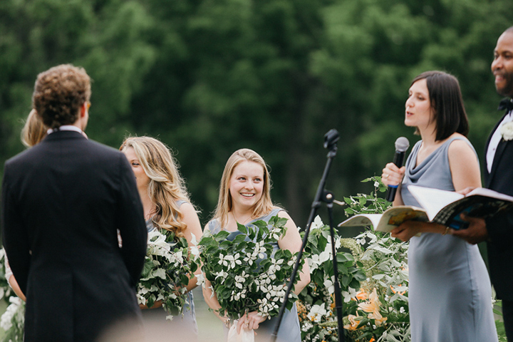 Bridesmaids Carry A Branch of Dogwood Blossoms