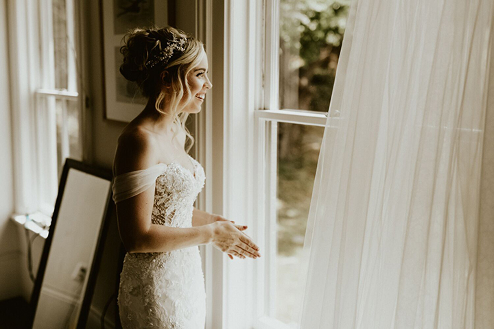 Joyful Bride Personalizes Her Martin Thornburg "Vada" Gown With Tulle Sleeves & Overskirt Desktop Image