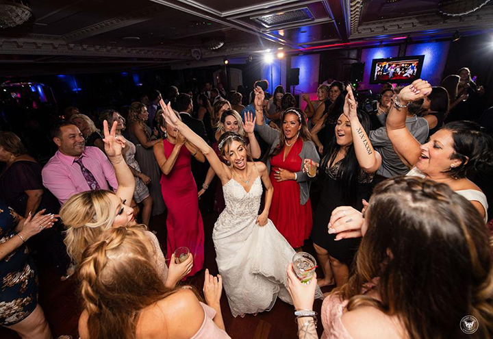 Rain Doesn't Put A Damper On This Late Summer Wedding