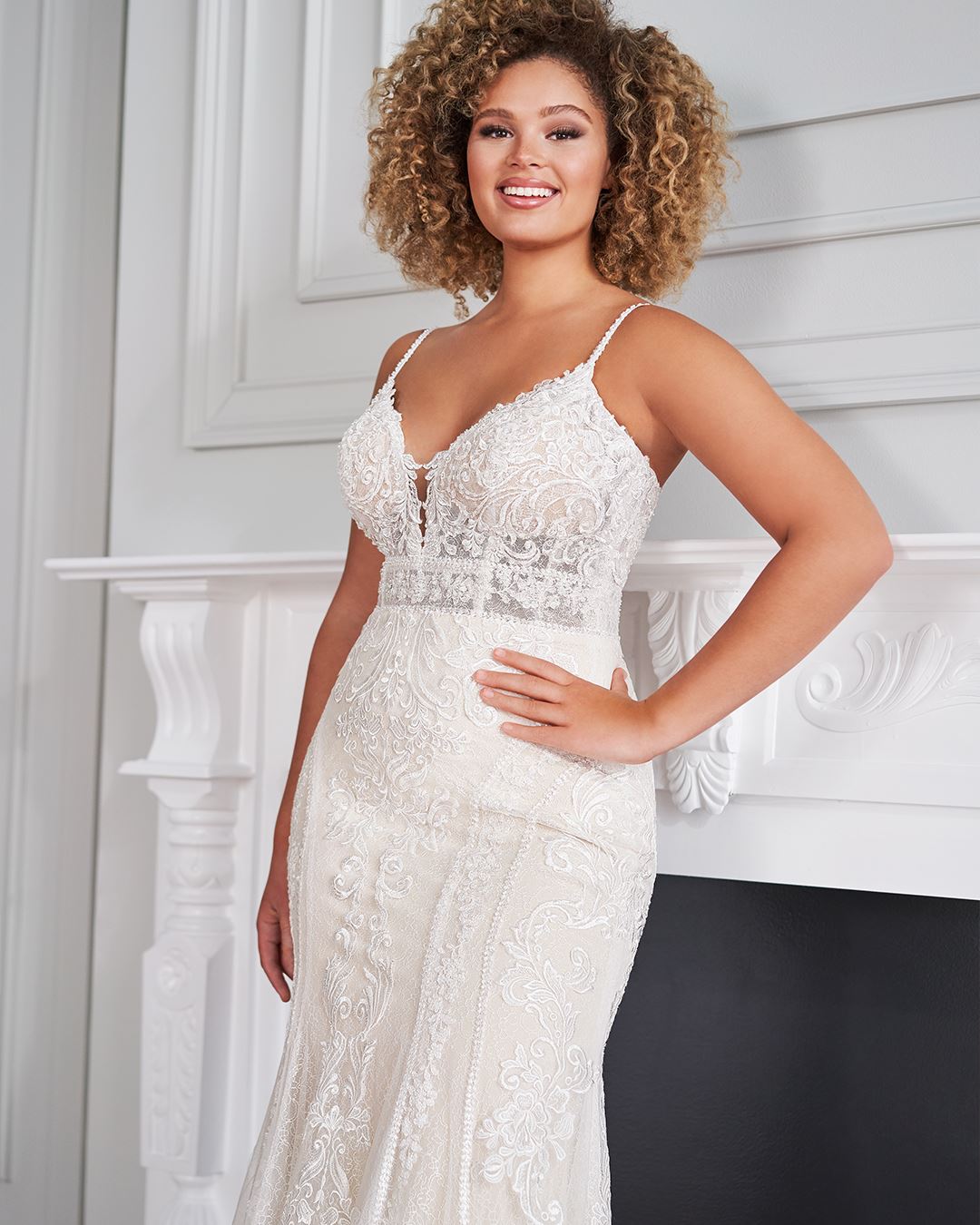 Bride wearing plus size mermaid wedding dress