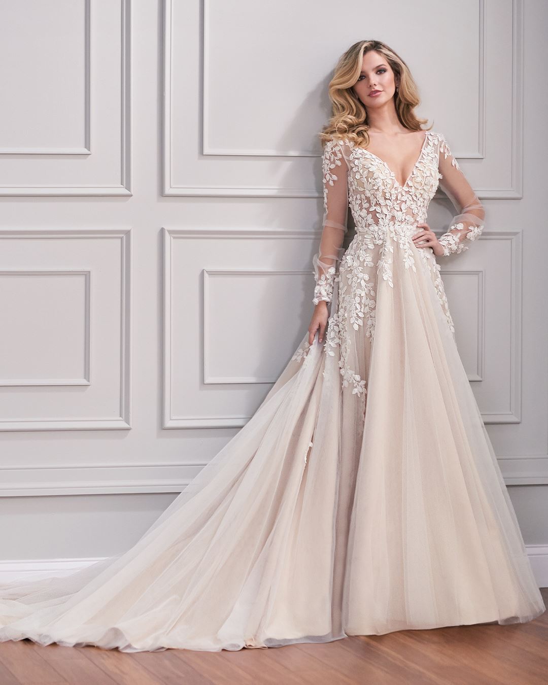 Bride wearing long sleeve wedding dress
