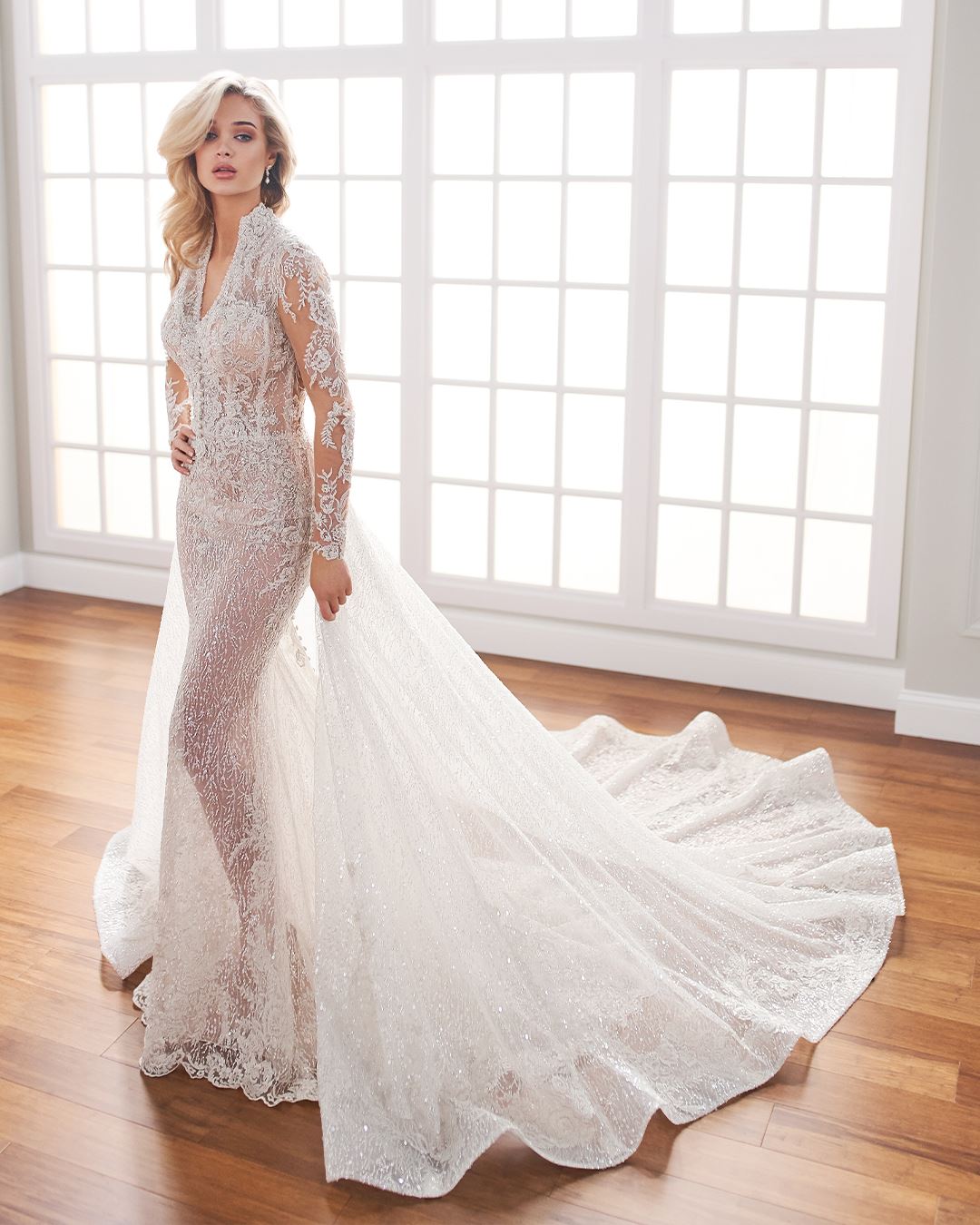 Bride wearing long sleeve wedding dress