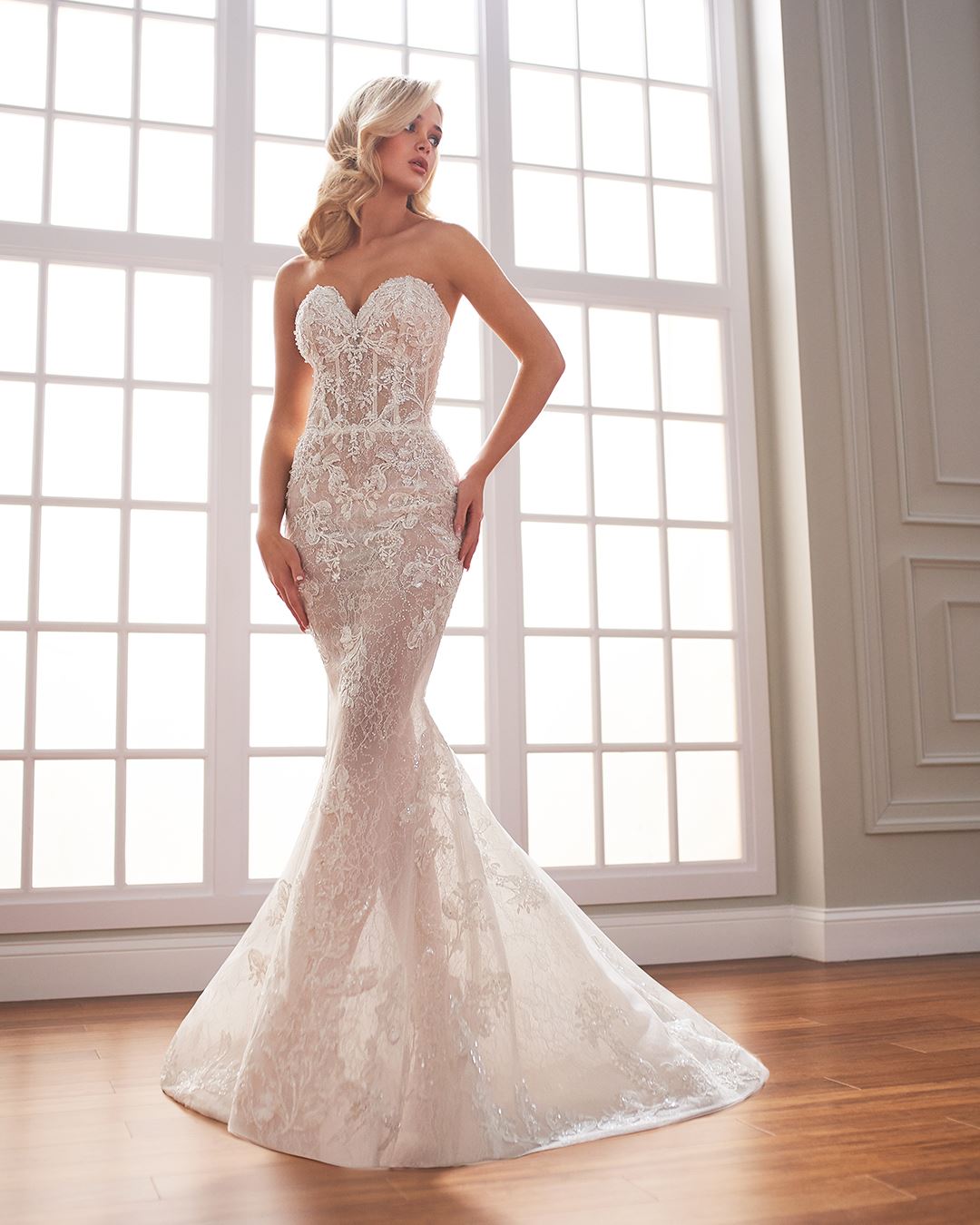 Bride wearing lace strapless wedding dress