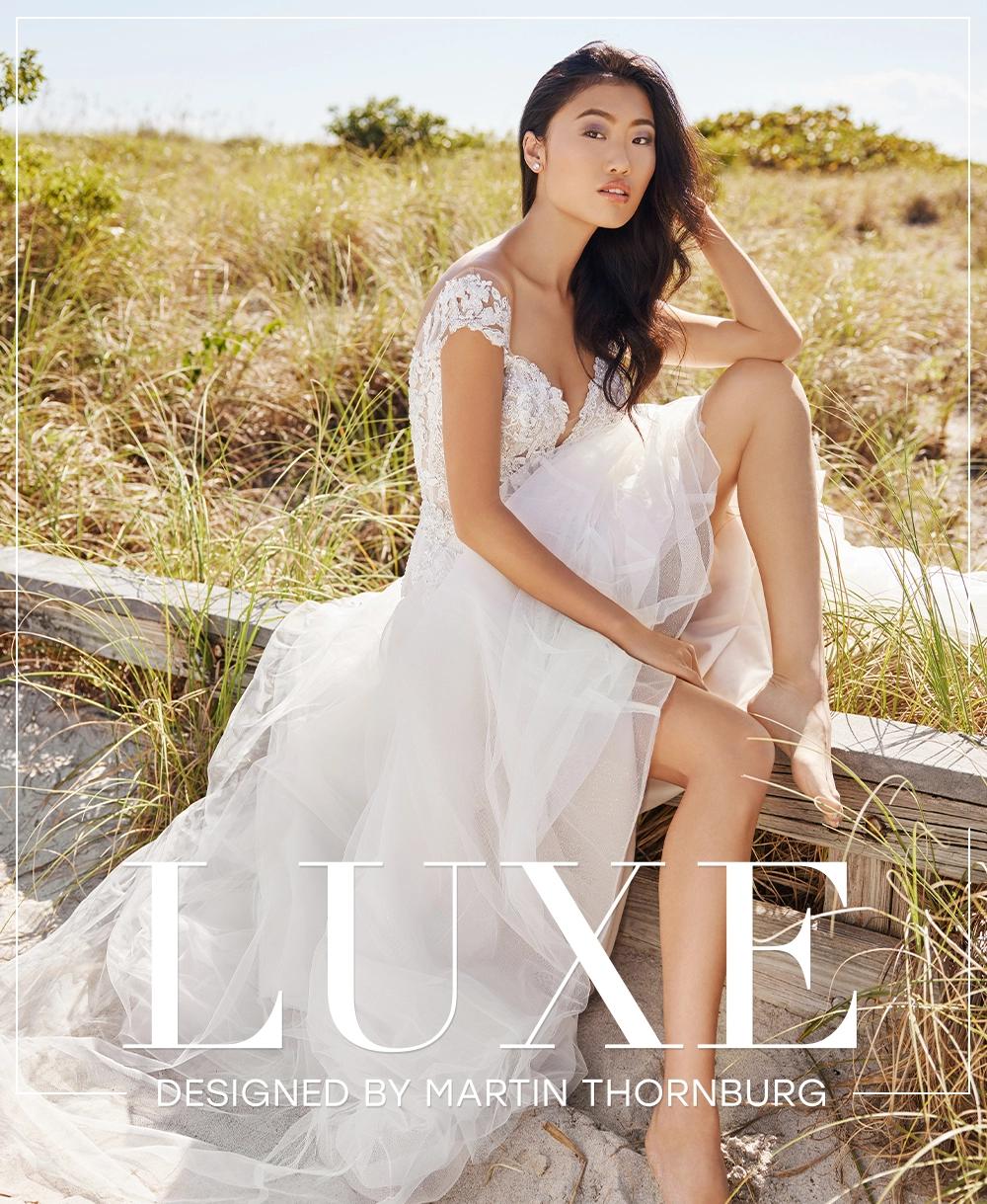 Model wearing Luxe by Martin Thornburg wedding dress