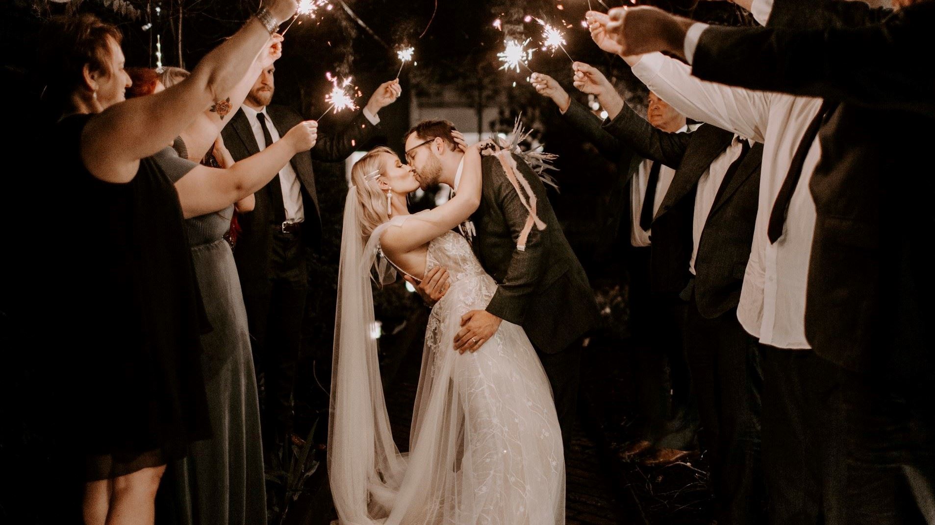 Bride and groom leaving their ceremony