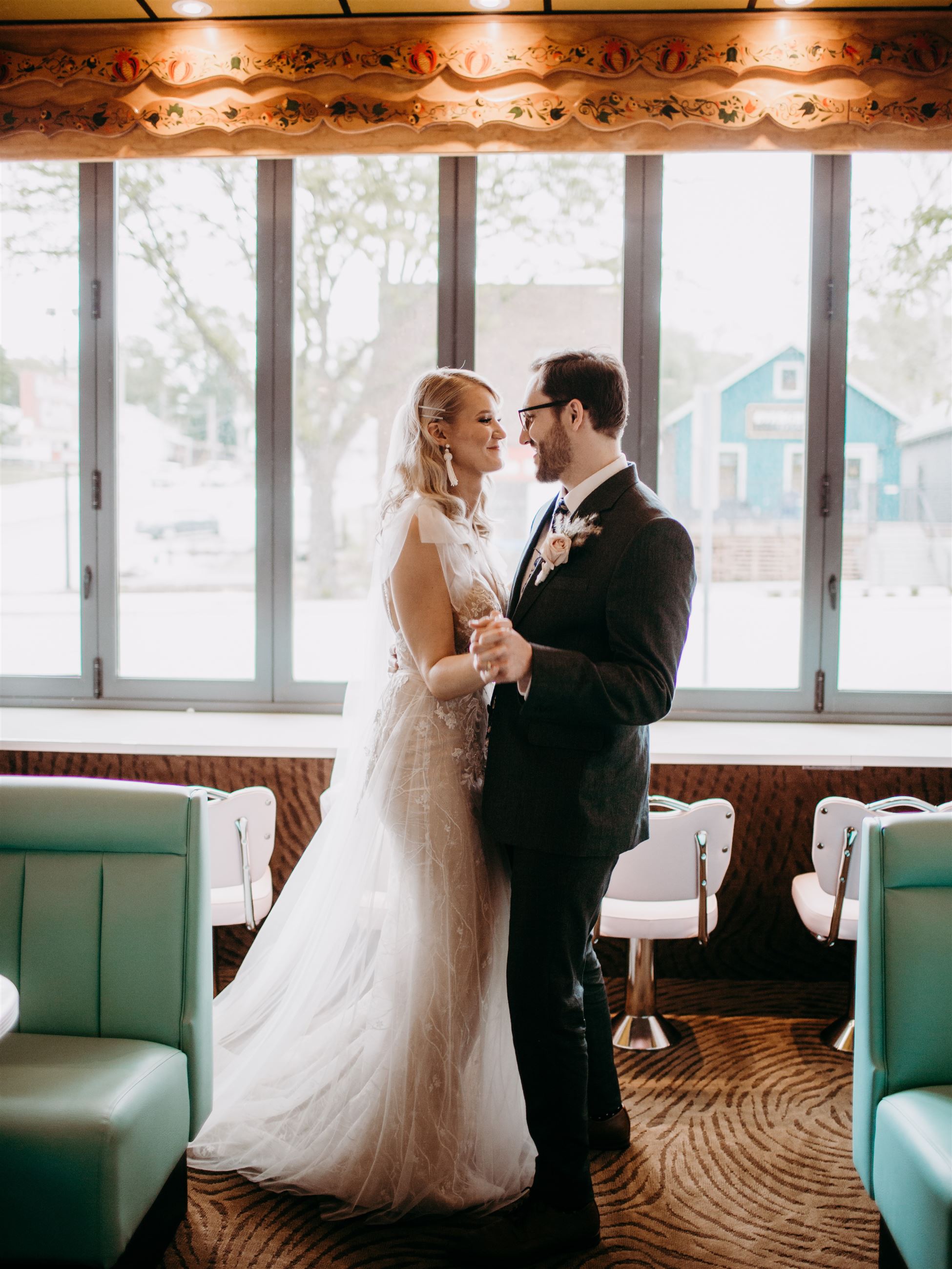 Bride and groom dancing together
