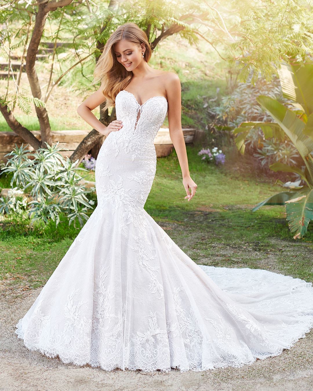 Bride wearing a strapless mermaid wedding dress