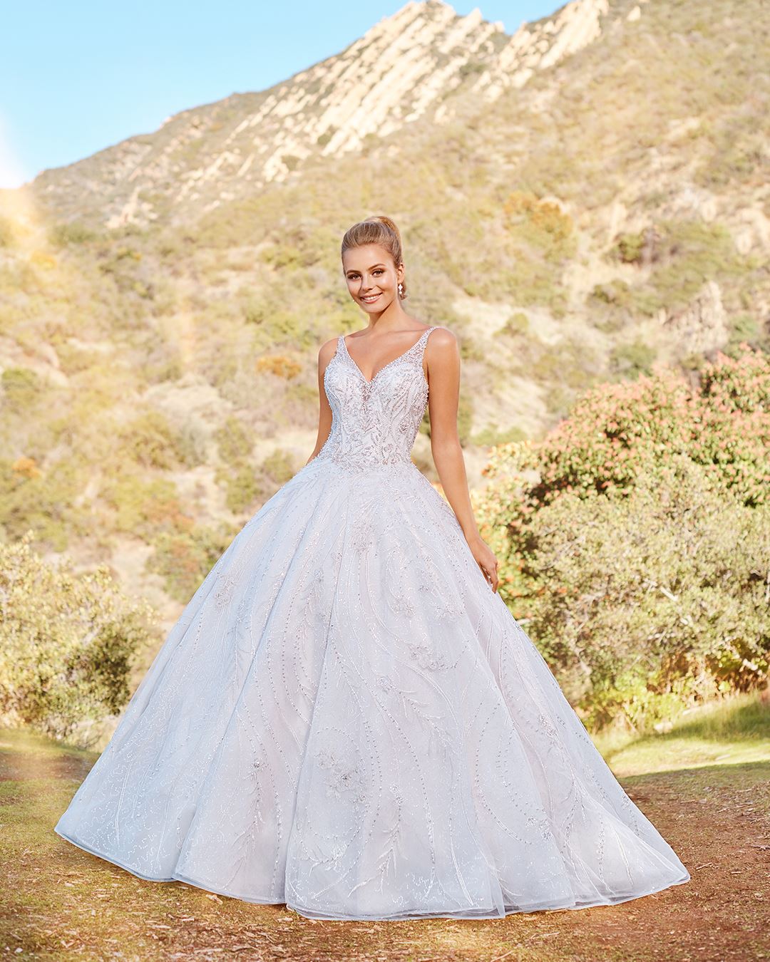 Bride wearing beaded ball gown wedding dress