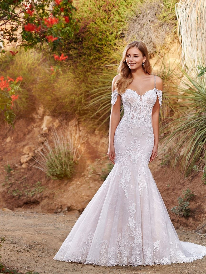 Bride wearing mermaid wedding dress by Martin Thornburg
