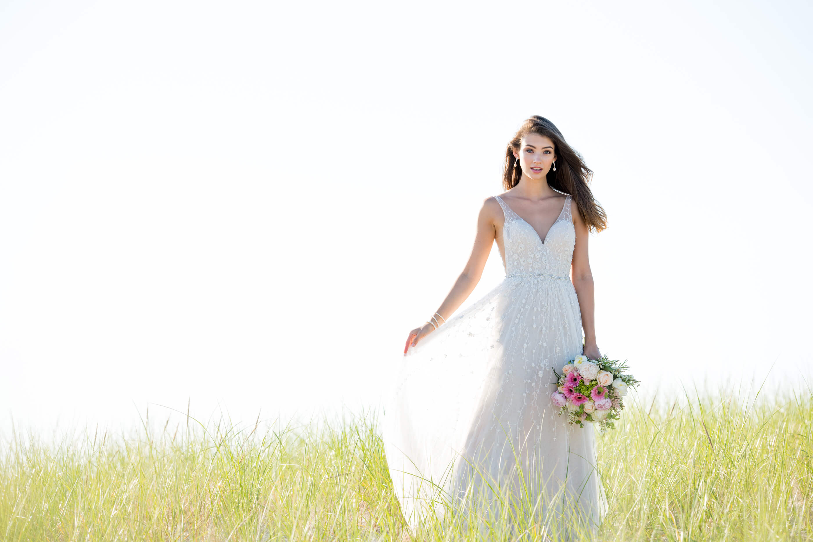 Brunette bride wearing Martin Thornburg wedding dress