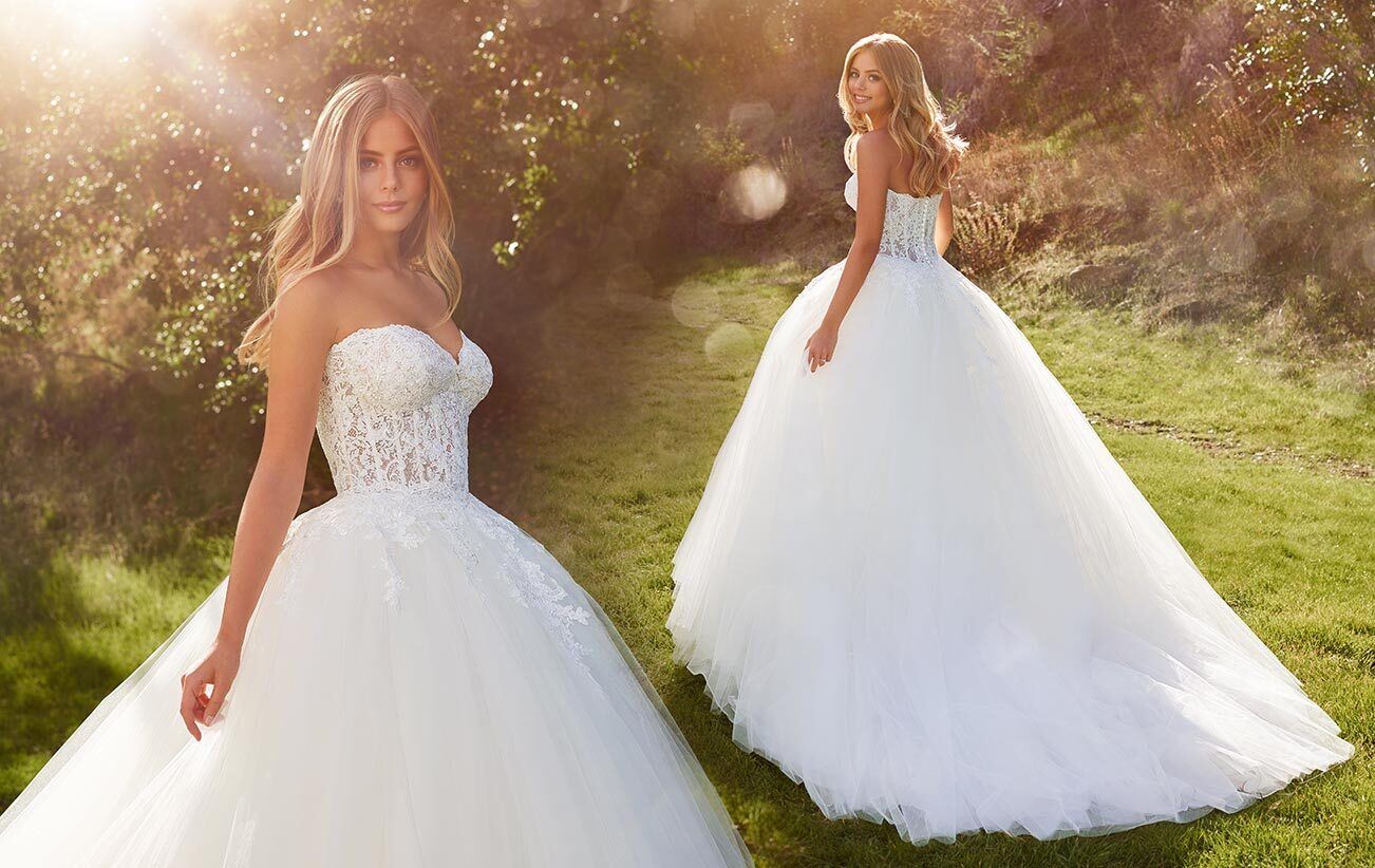 Blonde model in ball gown wedding dress by Martin Thornburg