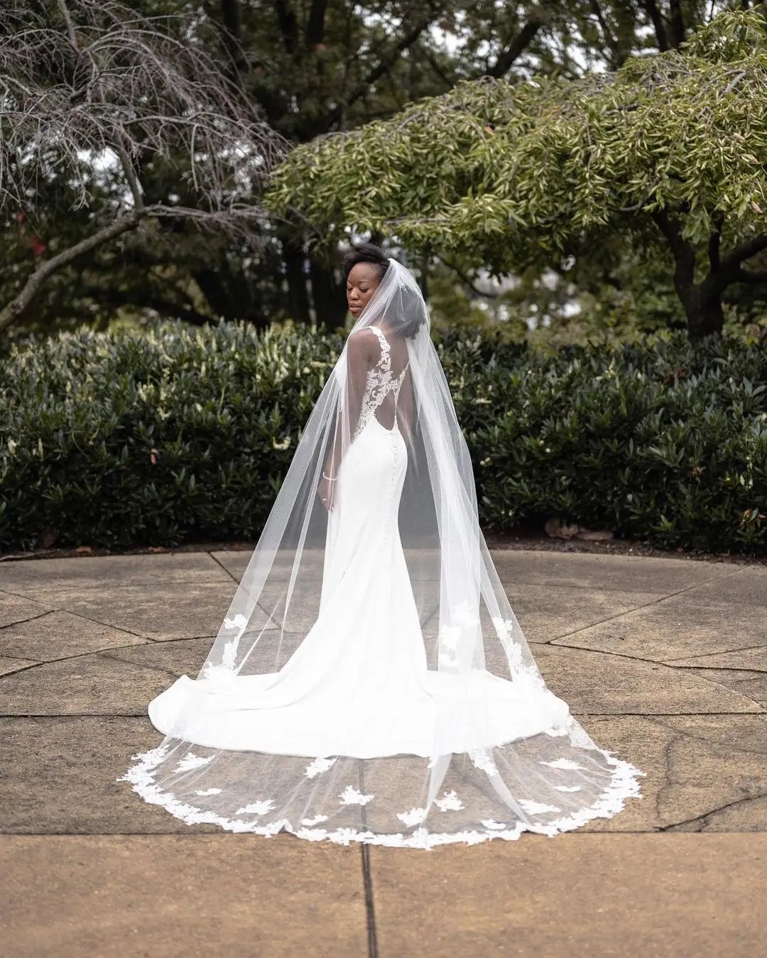 bride with veil from behind