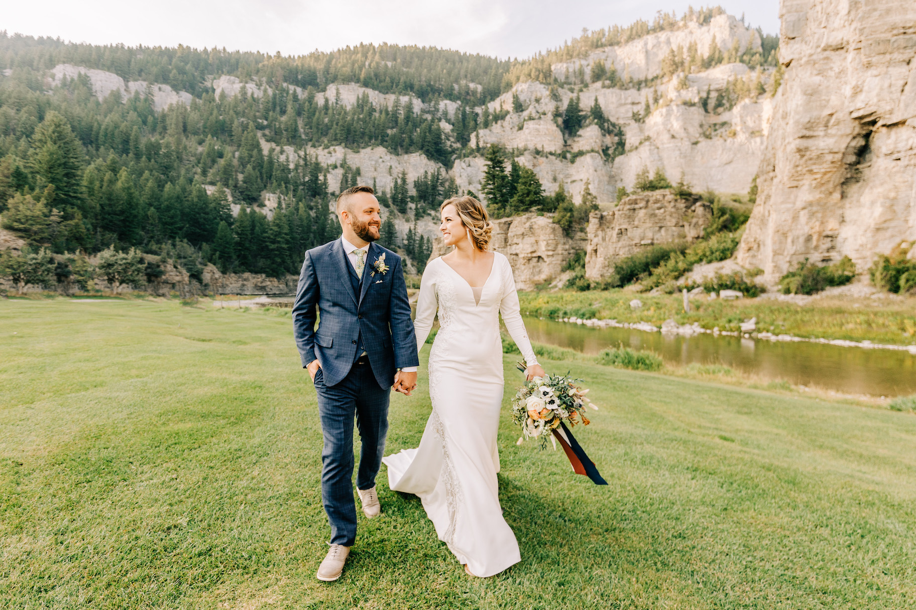 bride and groom in mountains