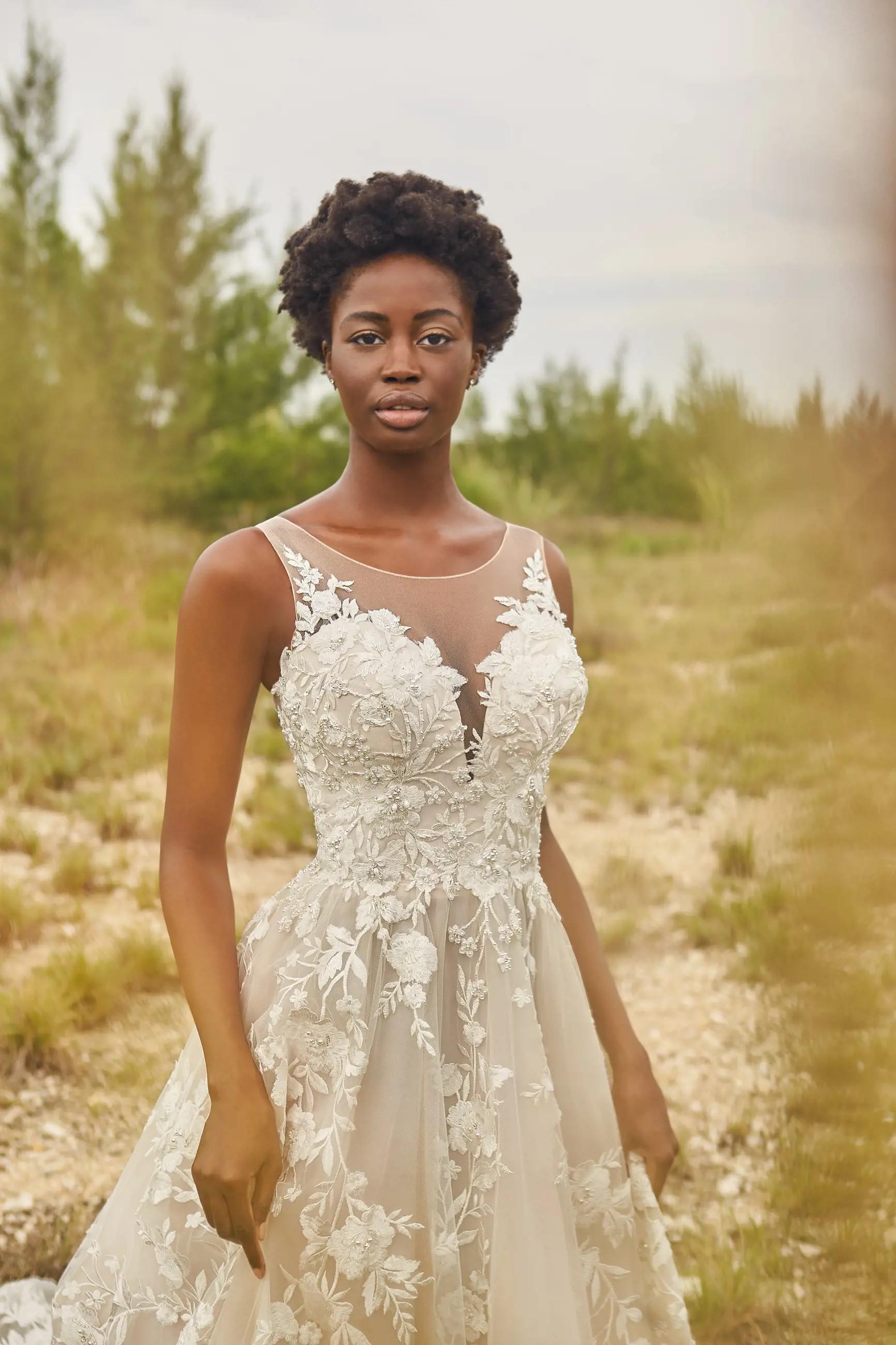 Model wearing a white gown