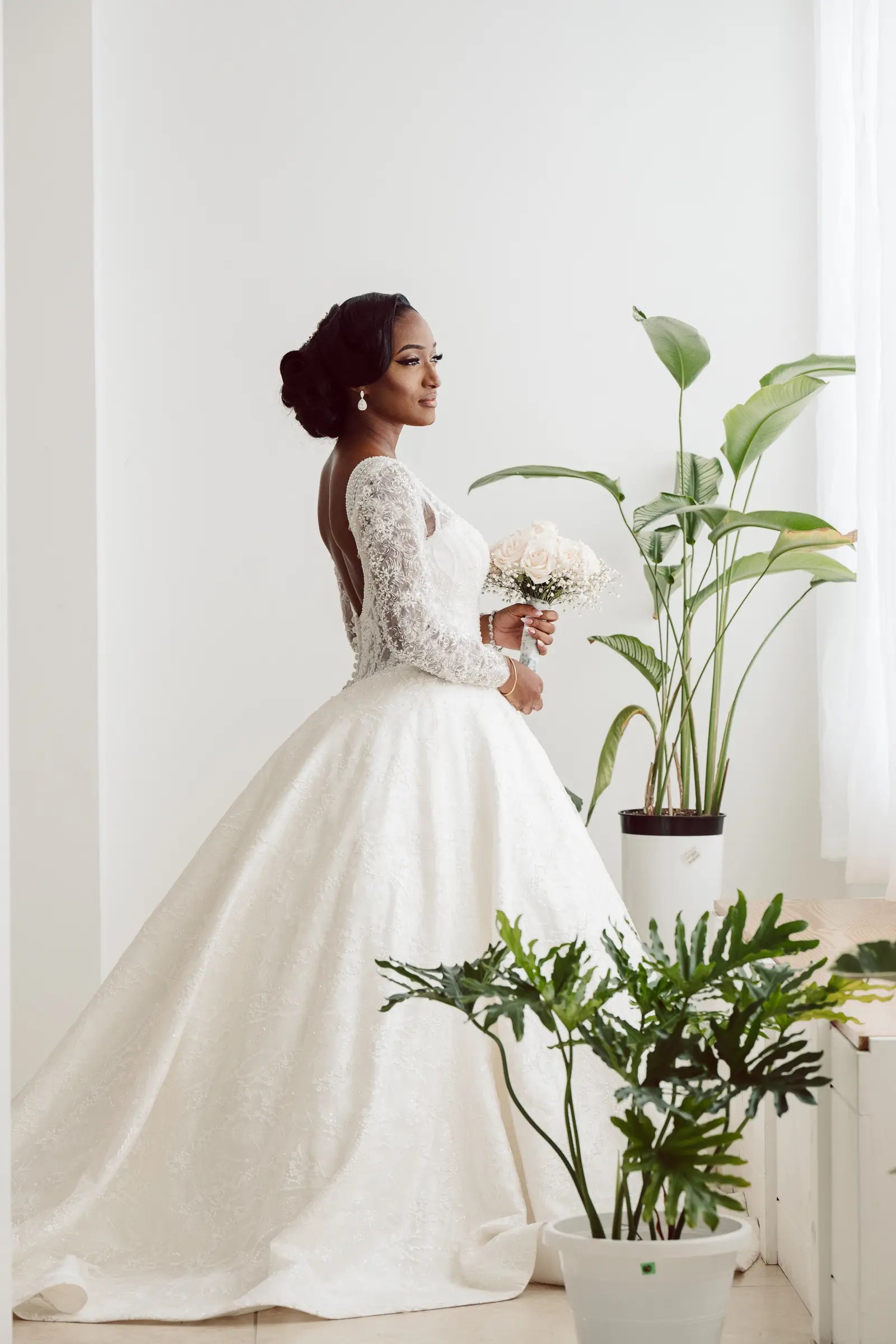 bridal portrait wearing long sleeve gown