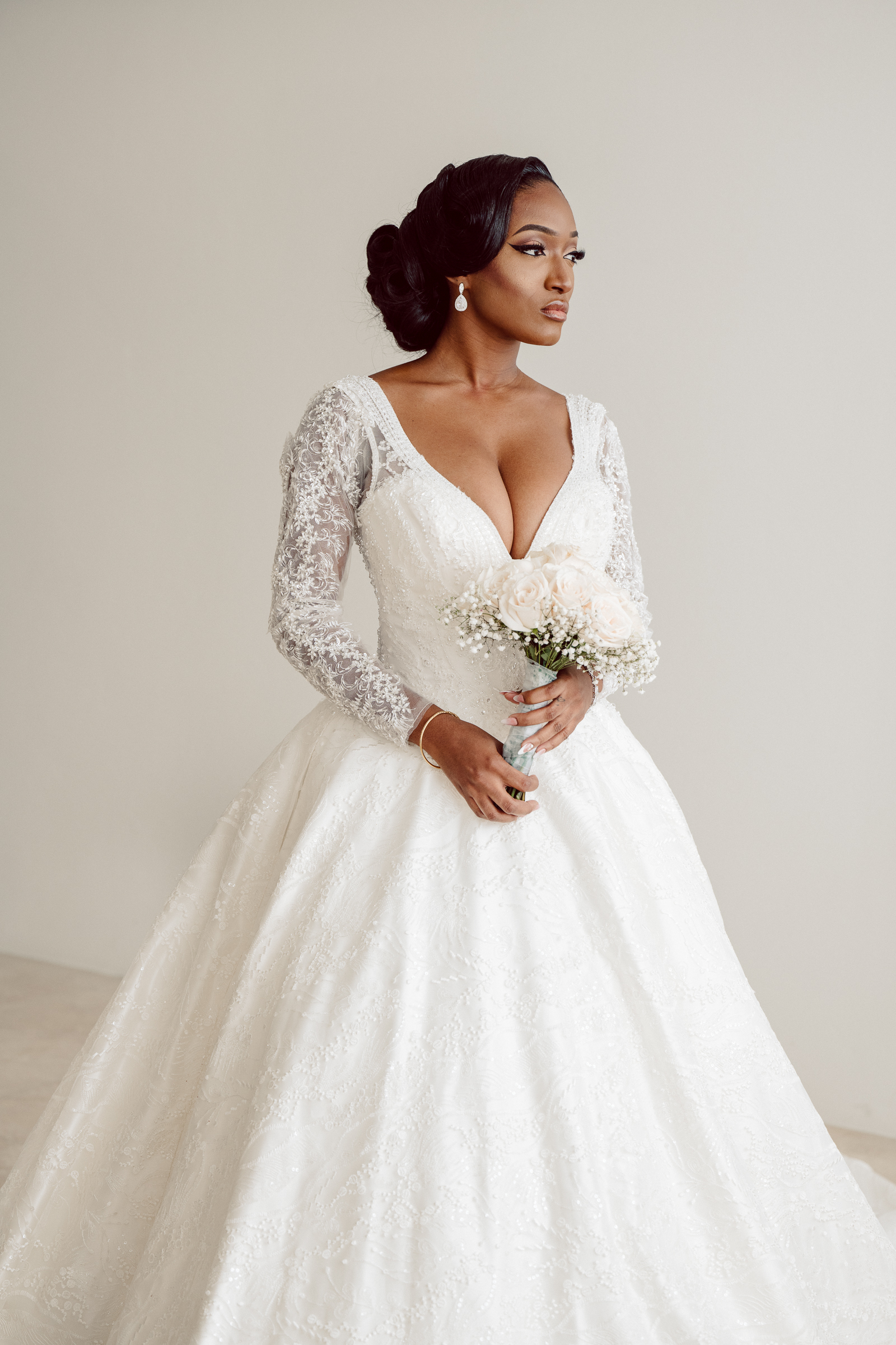 bridal portrait wearing long sleeve gown