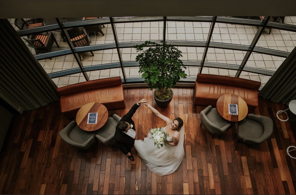 bride and groom dancing from above